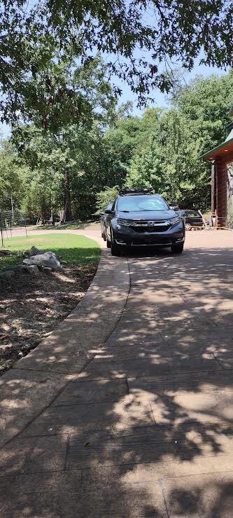 Parking area. Should hold 4 cars, in a row.