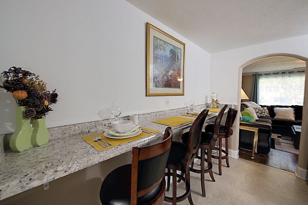 The Eating Bar looking back into the living room. Use this counter as workspace if needed.