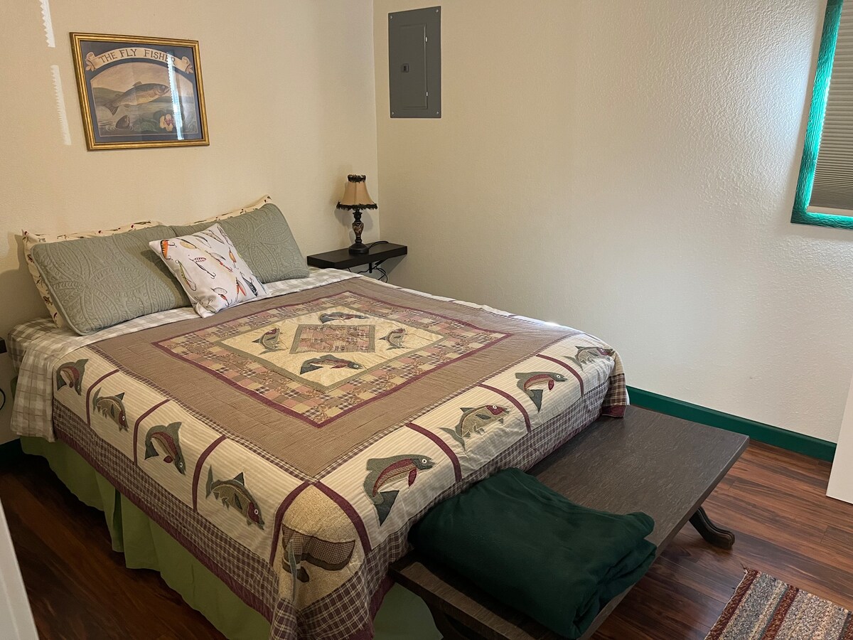 Downstairs bedroom with queen bed.